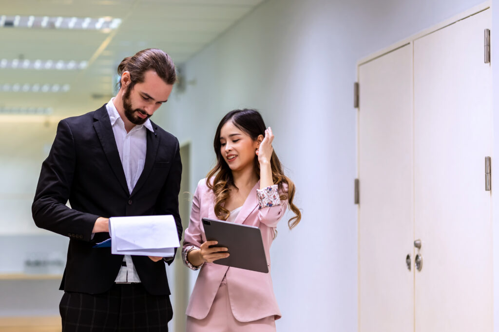 Diverse friend partners colleagues talking walking in modern of