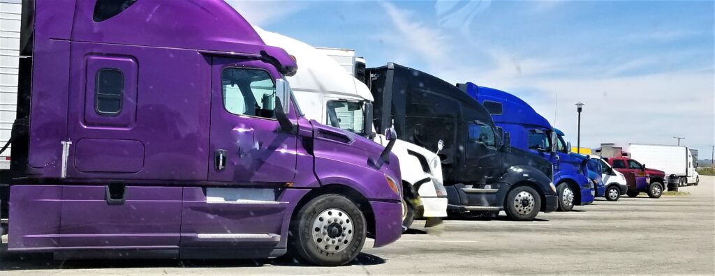 truck-stop-pretty-trucks-all-in-a-row-2023-11-27-05-17-54-utc